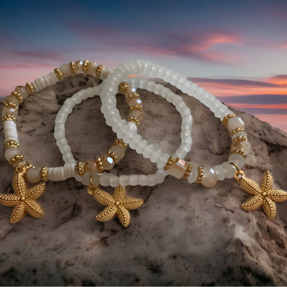 Set of Three Gold and White Starfish Charm Stretch Bracelet Set